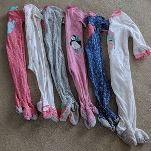 Six sets of footie pajamas